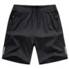 Boys' Loose Fit Athletic Shorts with Zipper Pockets Quick Dry Running Shorts